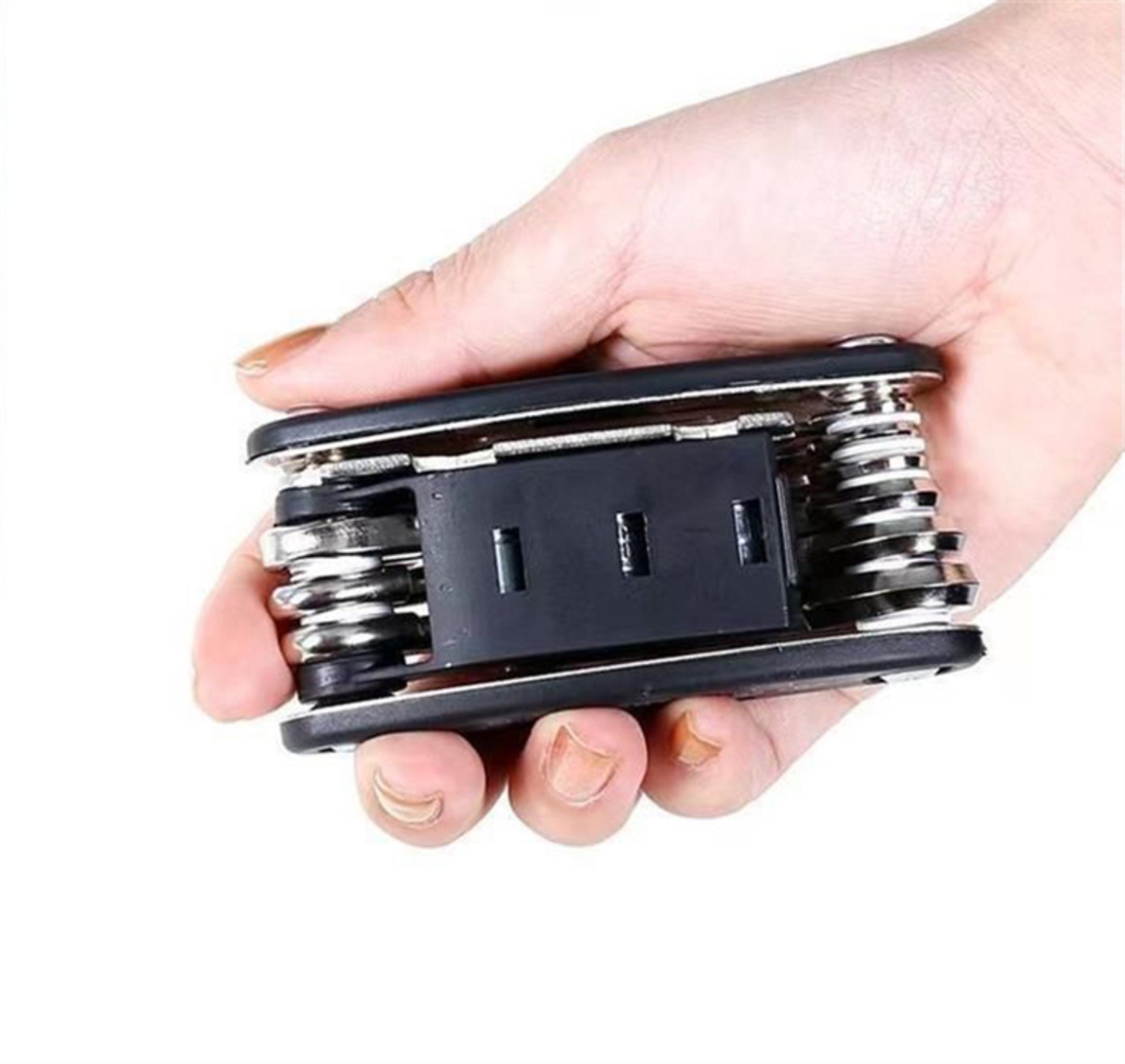 A hand holding the closed black folding multitool to demonstrate its compact pocket-size form.